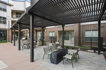 Two courtyards featuring grilling areas, outdoor games and cozy fire pits
